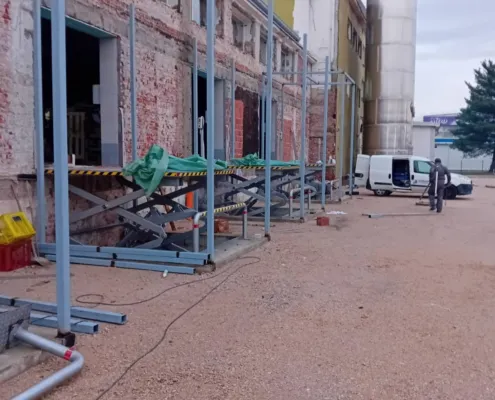 A row of platforms installed along a building